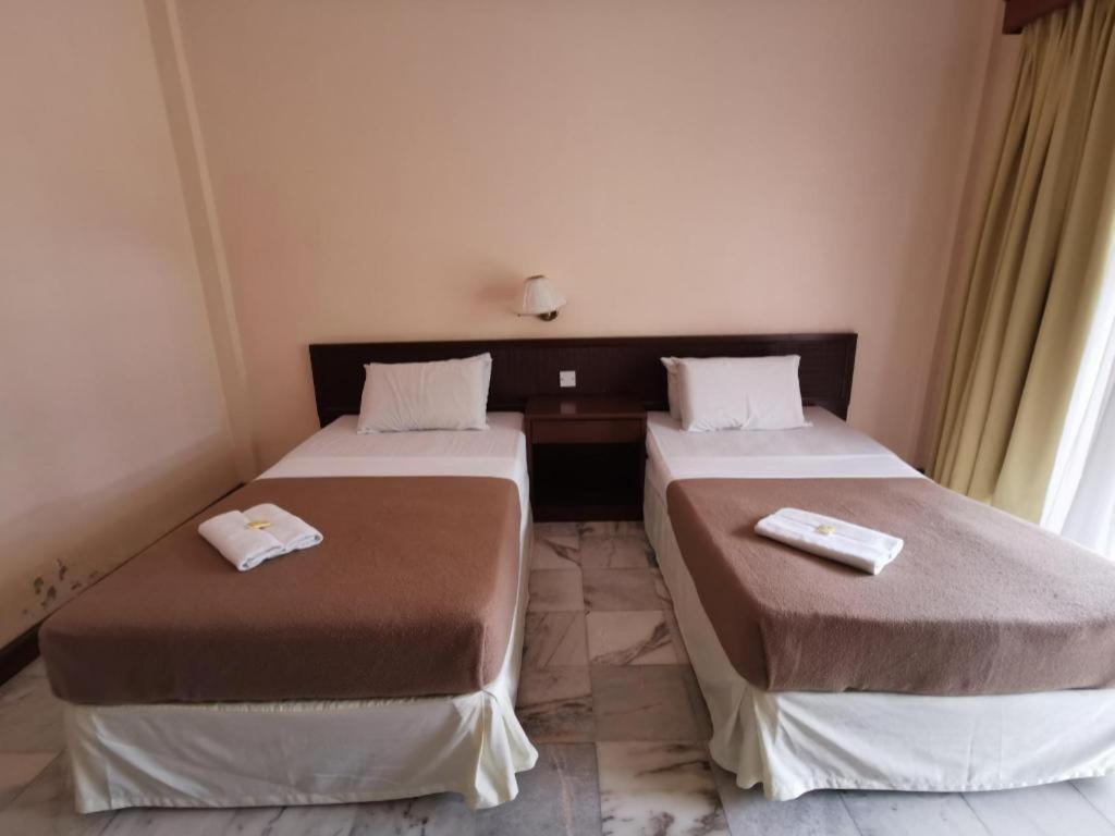Oyo 89972 Borneo Paradise Beach Hotel Kota Kinabalu Kültér fotó